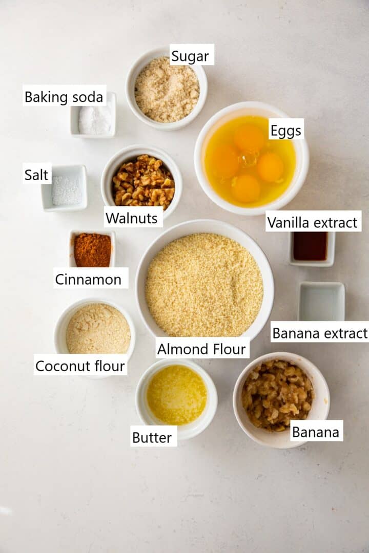 ingredients for making almond flour banana bread in separate bowls on a counter.