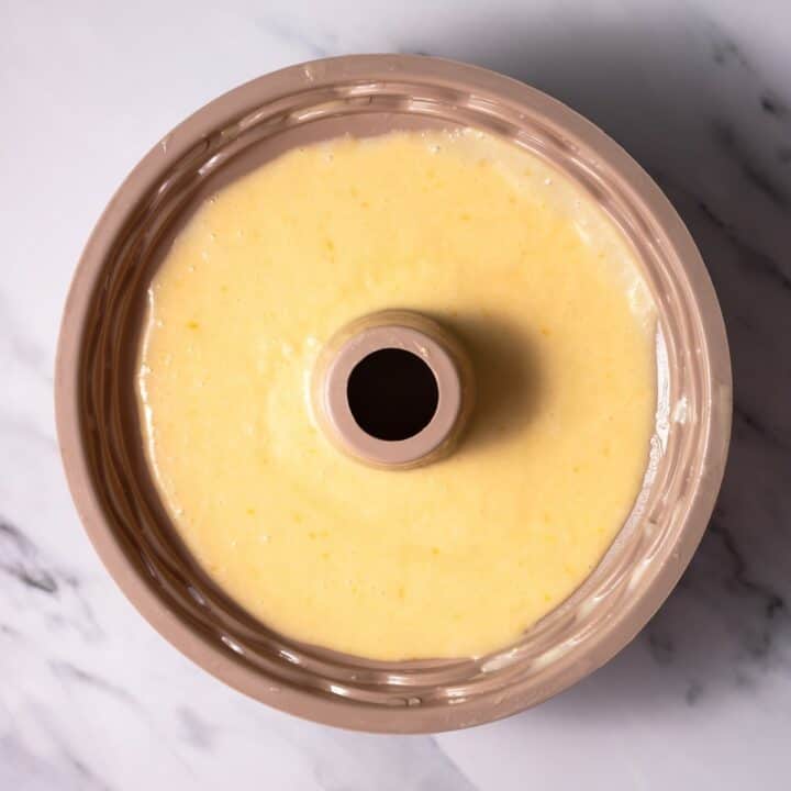 Bundt cake pan filled with cake batter.