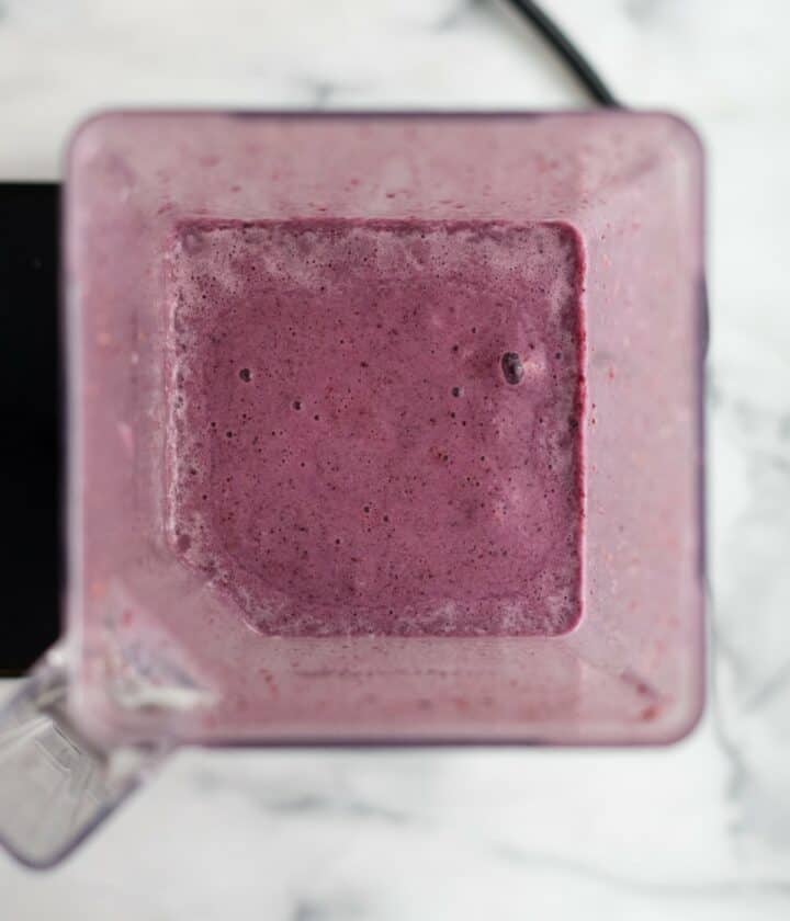 Blender containing blended keto berry smoothie