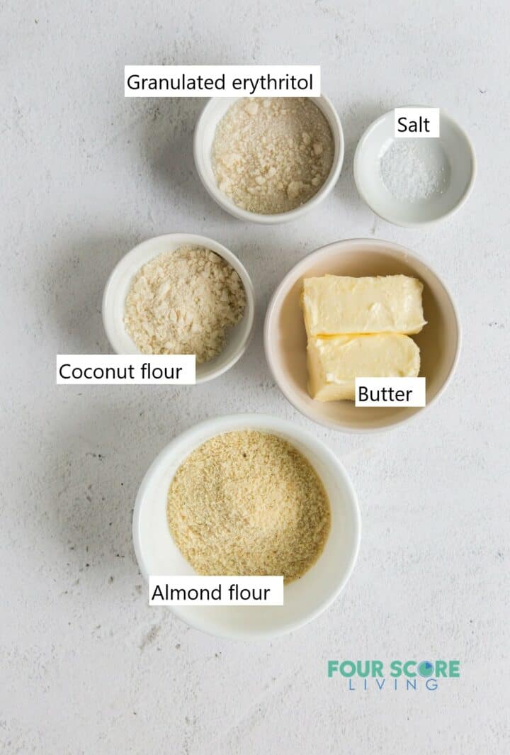 Ingredients needed for lemon bars crust in separate bowls.