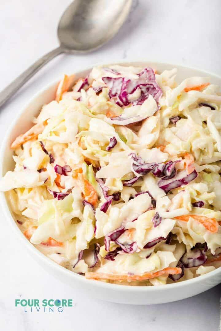 keto coleslaw in a white bowl.