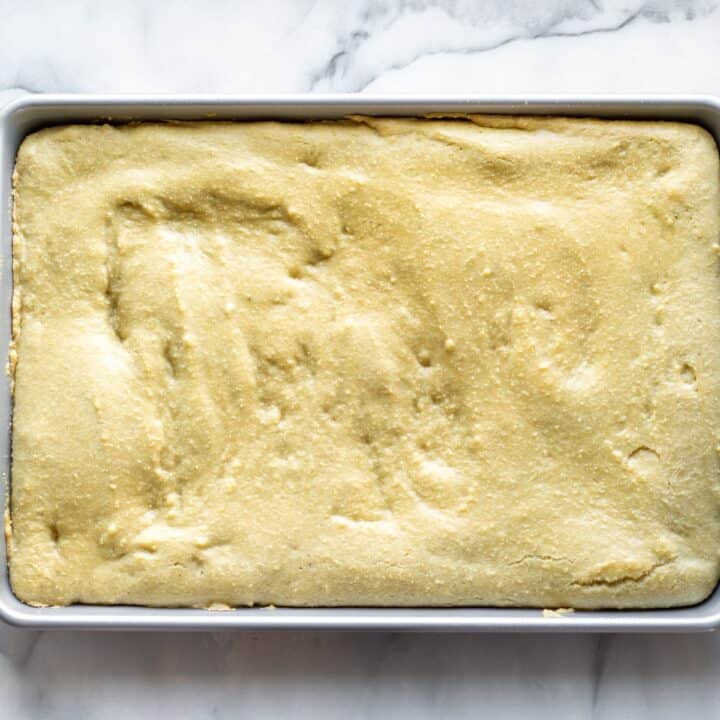 Rimmed baking sheet with baked keto stuffing bread.