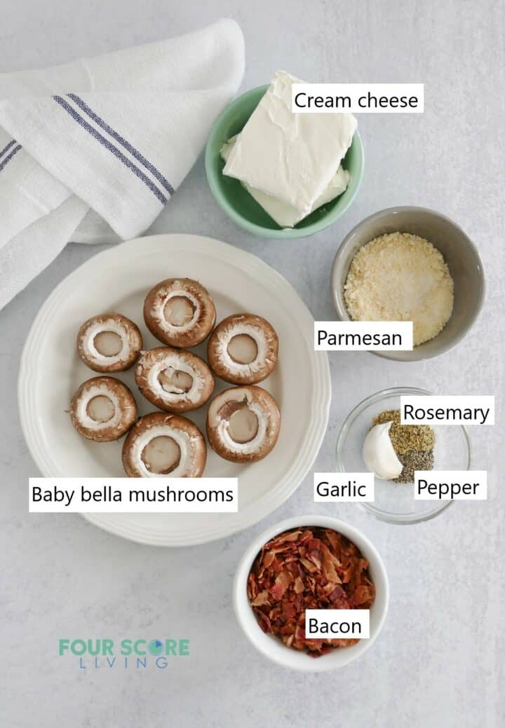 Ingredients for making keto stuffed mushrooms in individual bowls.