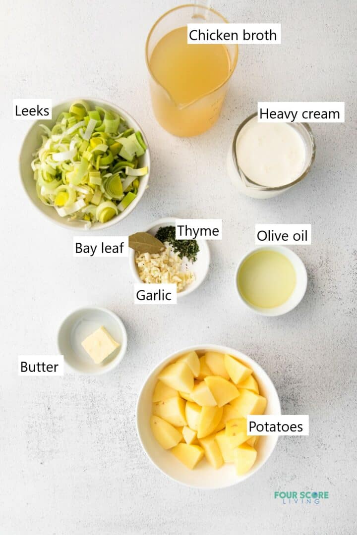 Ingredients to make magic leek soup, in separate bowls.