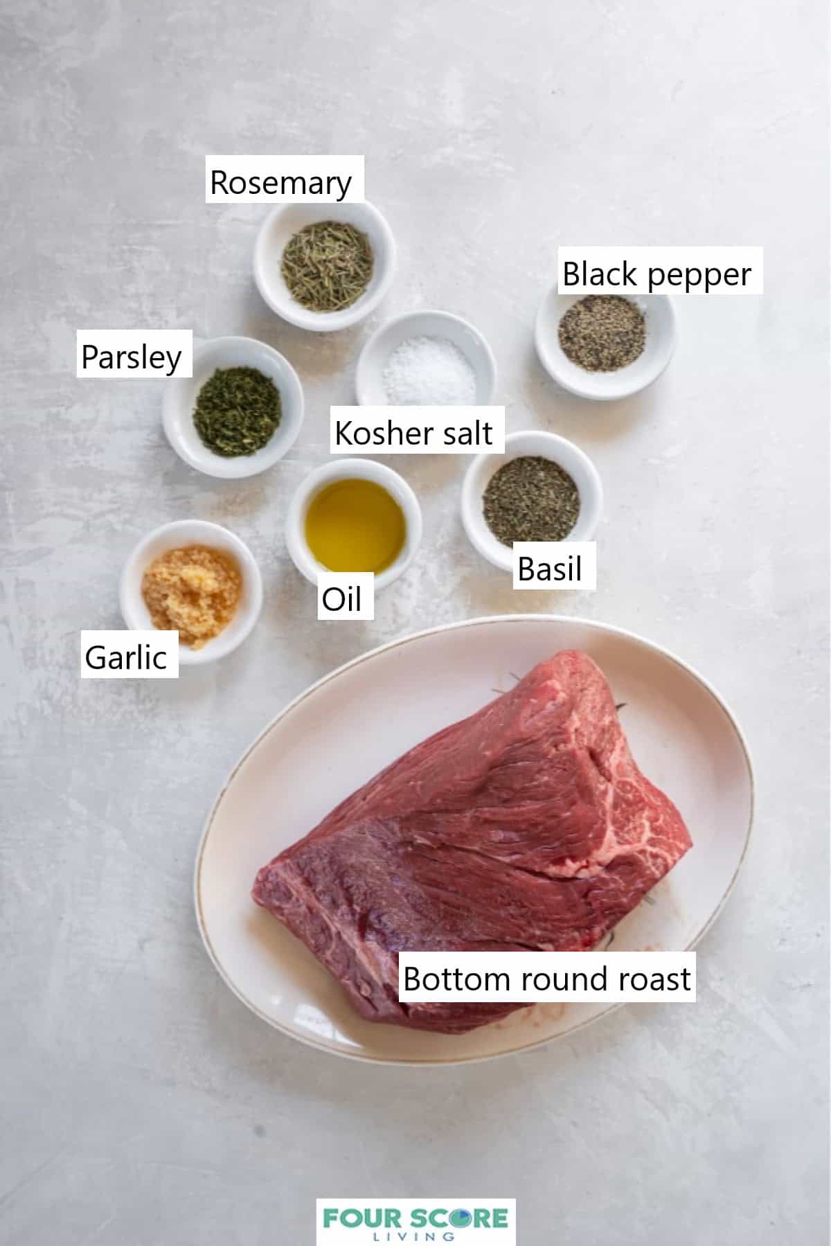 Ingredients for making a beef bottom round roast, all in individual bowls.