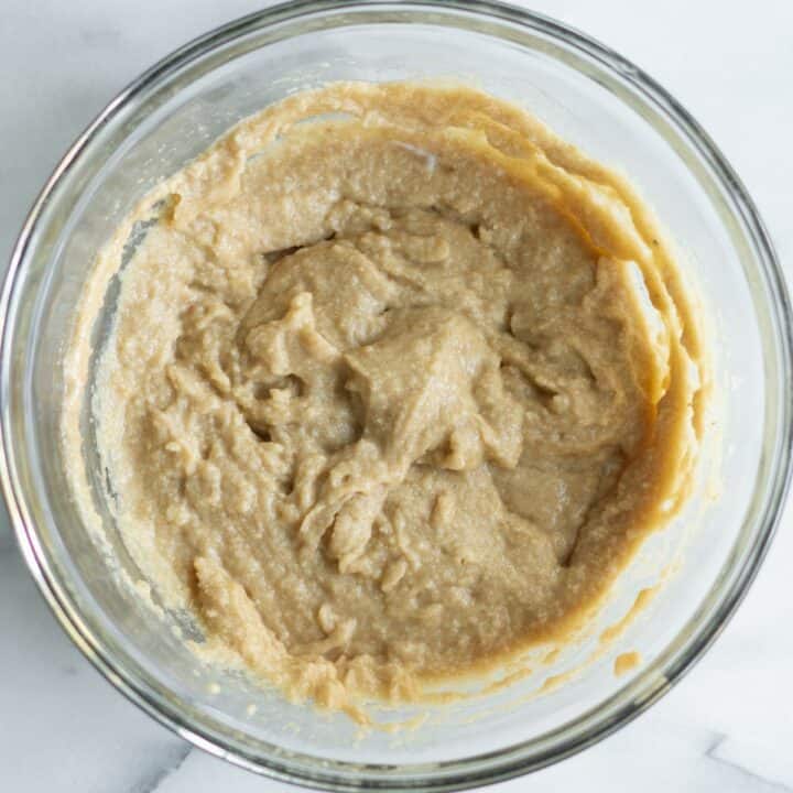 Keto cinnamon sugar donut batter in a glass bowl.