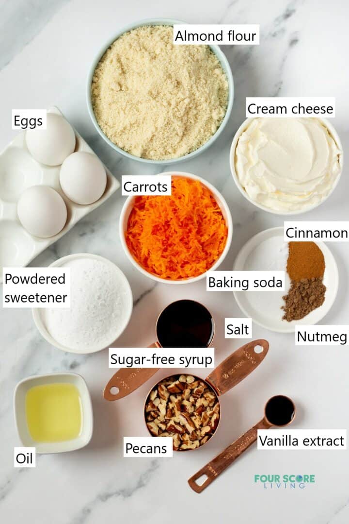 Ingredients needed to make low carb carrot cake bars all measured and in individual containers.