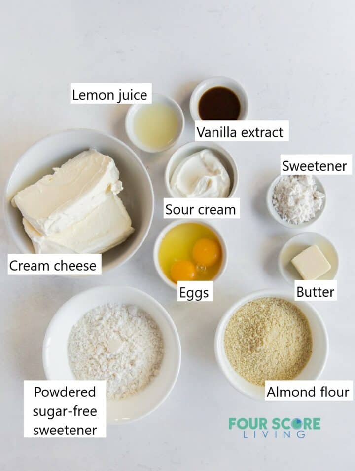 Ingredients needed for making a keto cheesecake all in individual bowls.